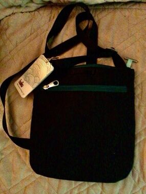 Never used black Haiku cross body bag for sale